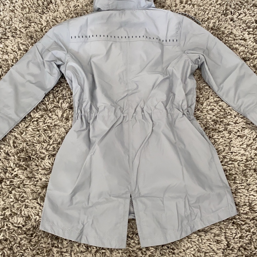 UNDER ARMOUR HOODED WINDBREAKER XS - Picture 10 of 11